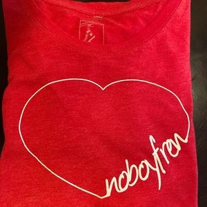 Anjelah Johnson nail salon, no boyfriend tee. Single, Red Valentine’s Day tee.